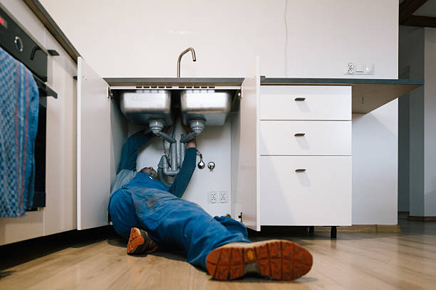 Professional Drain Cleaning technician working in Rimforest, CA